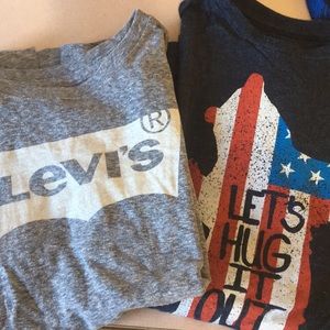 2 Boys size large short sleeved shirts